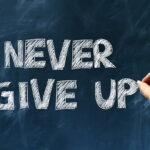 Never Give Up Banner