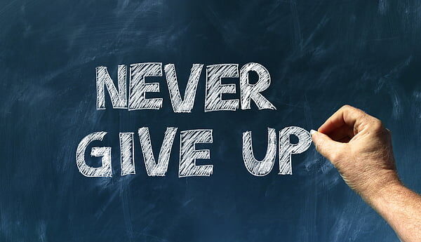 Never Give Up Banner