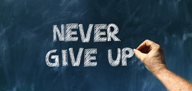 Never Give Up Banner